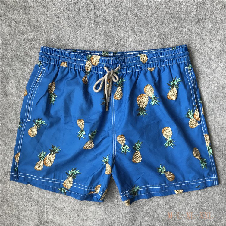 Blue pineapple print board shorts