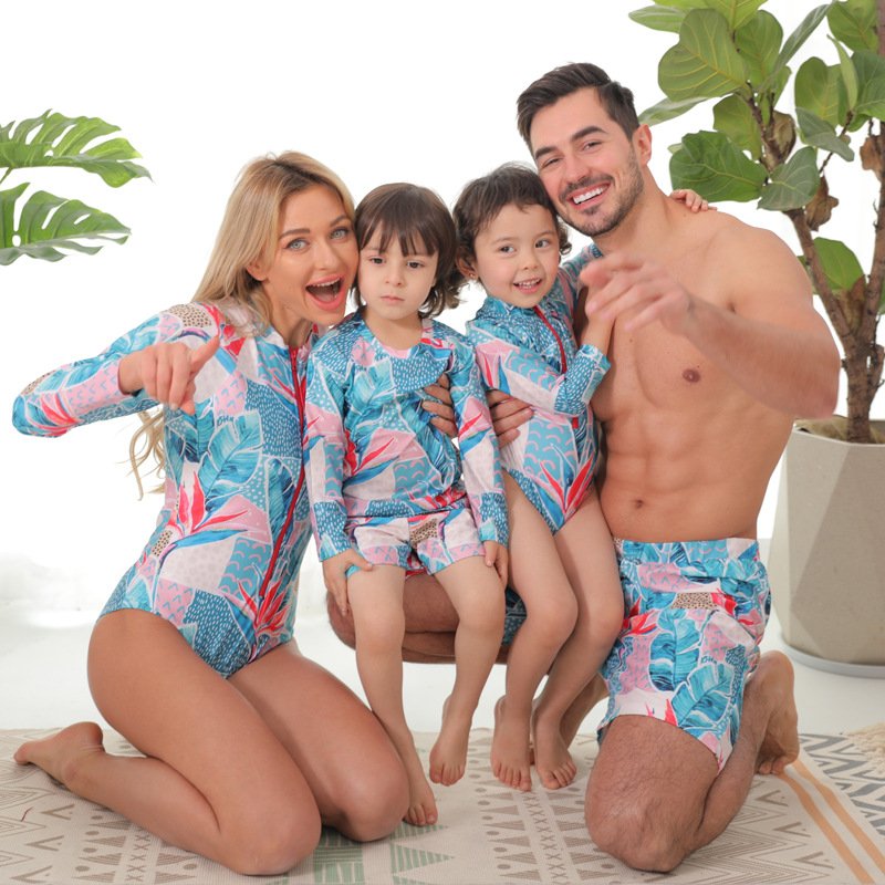 Father and children wearing authorized matching custom printed board shorts