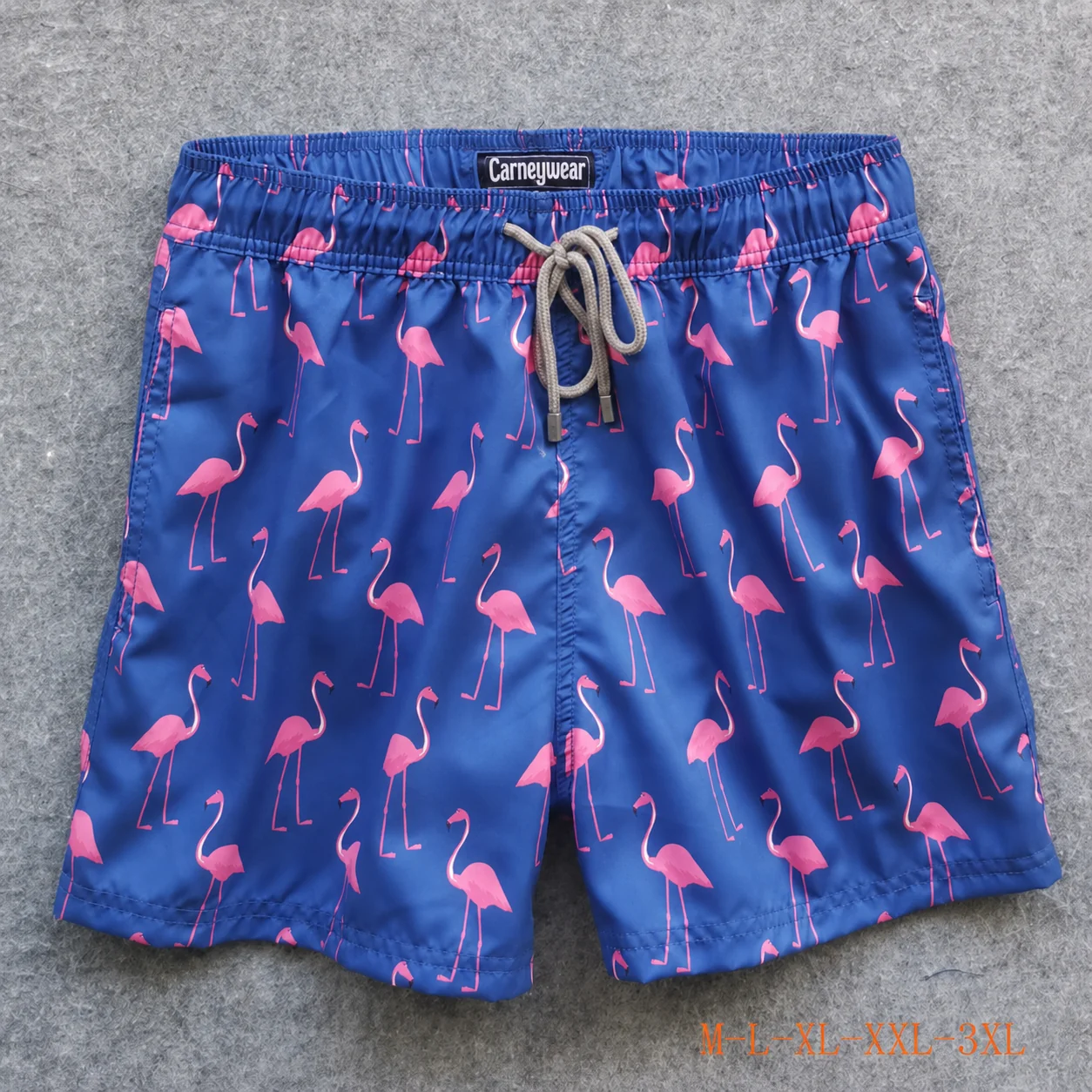 Front view of Navy Pink Flamingo Board Shorts