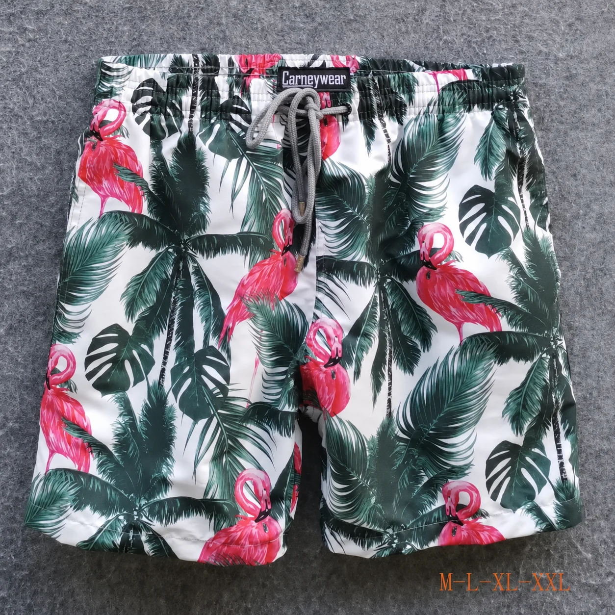 Front view of White Flamingo Leaf Board Shorts