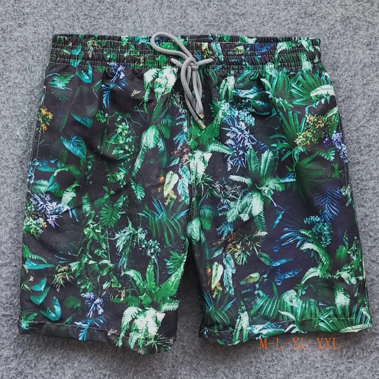 Front view of Navy Green Jungle Board Shorts
